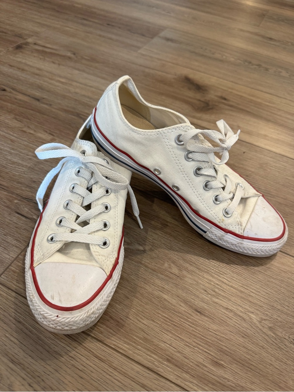 Converse Chuck Taylor All Star low-top sneakers in white canvas